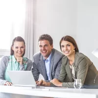 depositphotos_183636340-stock-photo-portrait-smiling-young-business-people